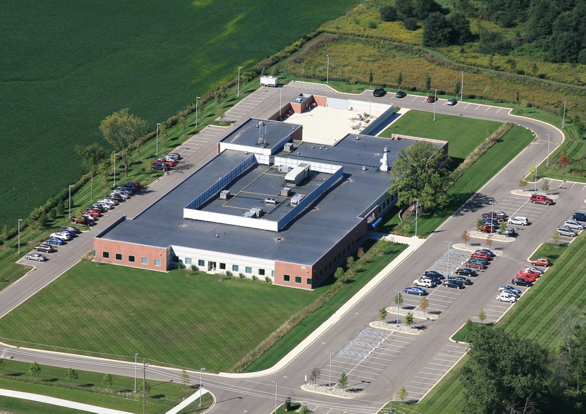 photo taken from a plane that shows the NOAA GLERL laboratory building surrounded by a parking lot
