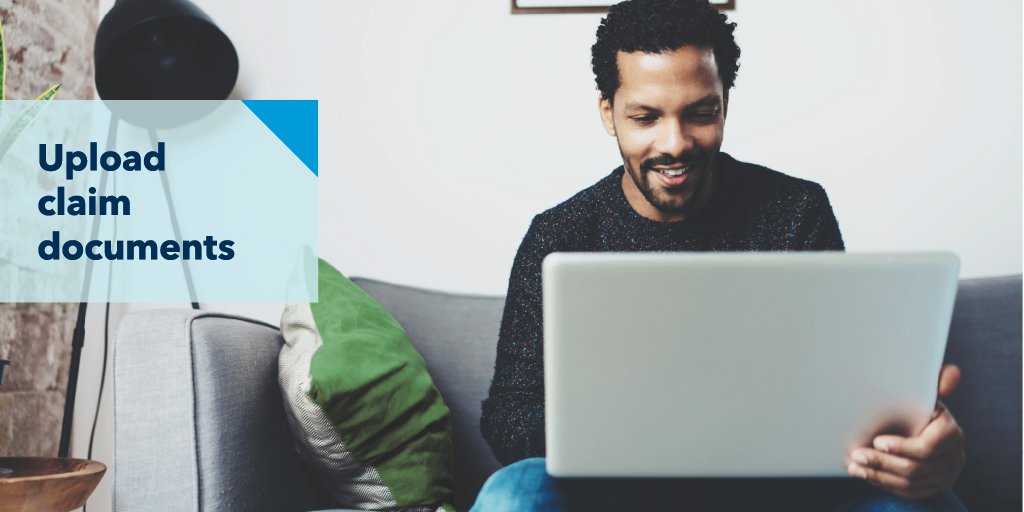 Man looking at a laptop. The text reads upload claim documents. 