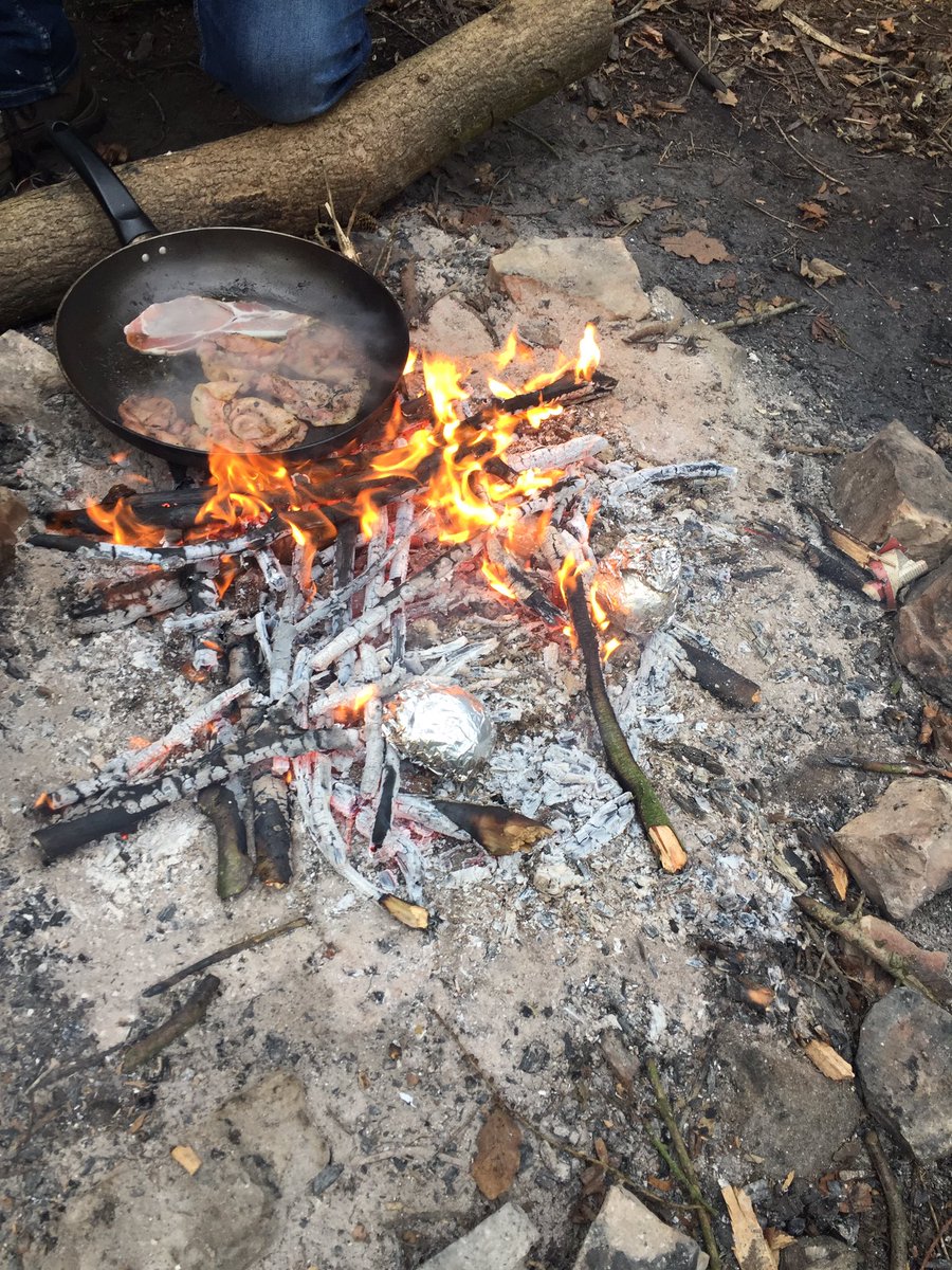 ElemoreForestS1's tweet photo. Back out in the woods with some of our more camera-shy pupils 📸 today’s lesson - cooking on a campfire! We had bacon butties, as well as choc cake cooked in oranges! Delicious! #forestschool #outdoored #campfirecooking https://t.co/rqd69JhBcV