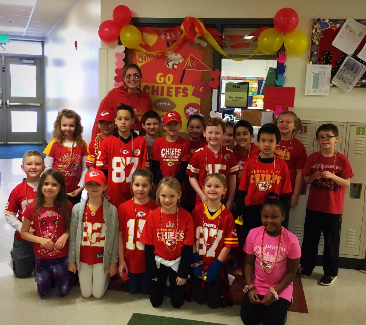 ShannaMingee's tweet photo. 🏈What a fun RED Friday! Thanks @bp_mustangs PTA for the fun door decorations and beads! We are ready for a Chiefs win! ❤️💛❤️ https://t.co/S7KGTFHD6i