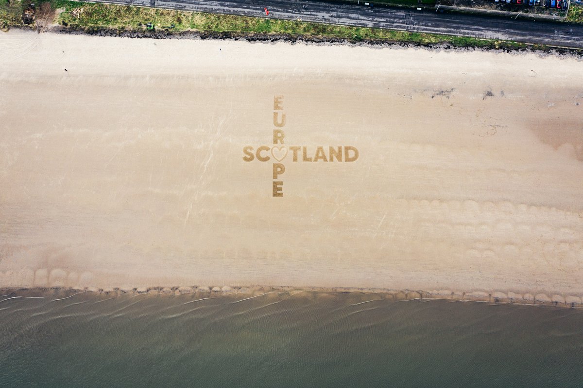 A message written into the beach saying SCOTLAND hearts EUROPE