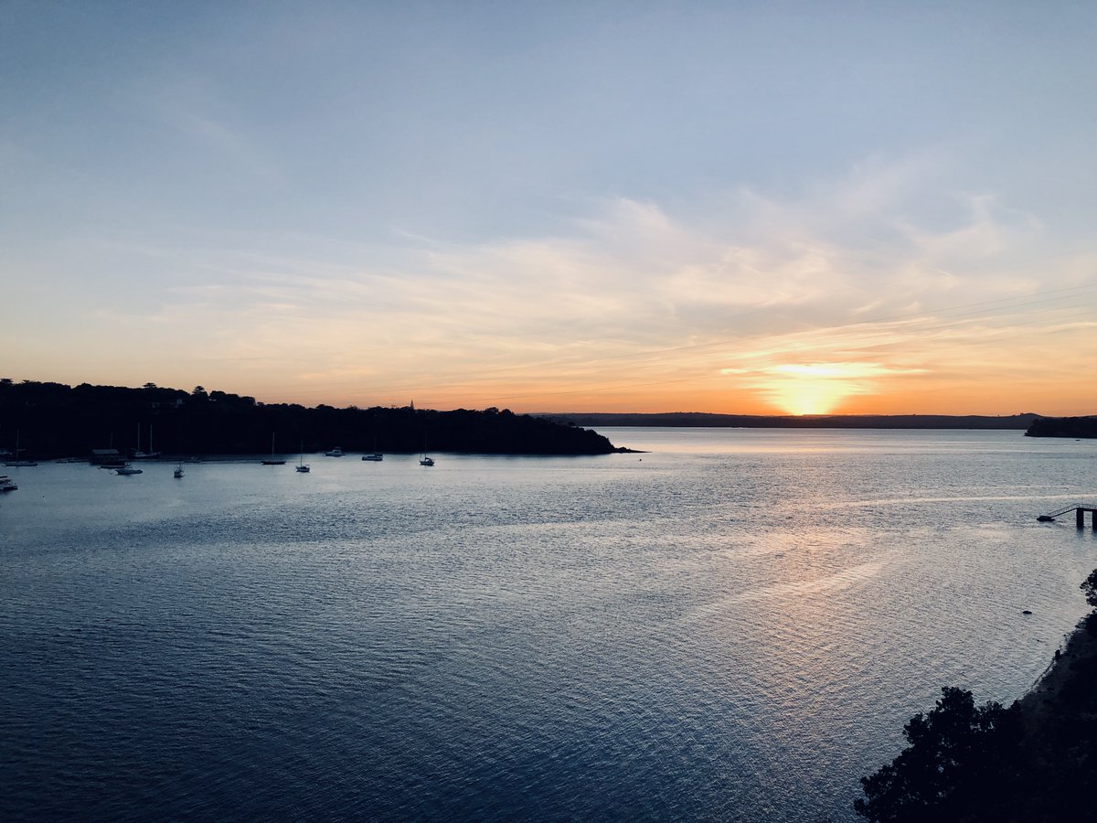 Sunset near a bridge connecting the two sides of an Ocean Creek, in Kilifi town. 