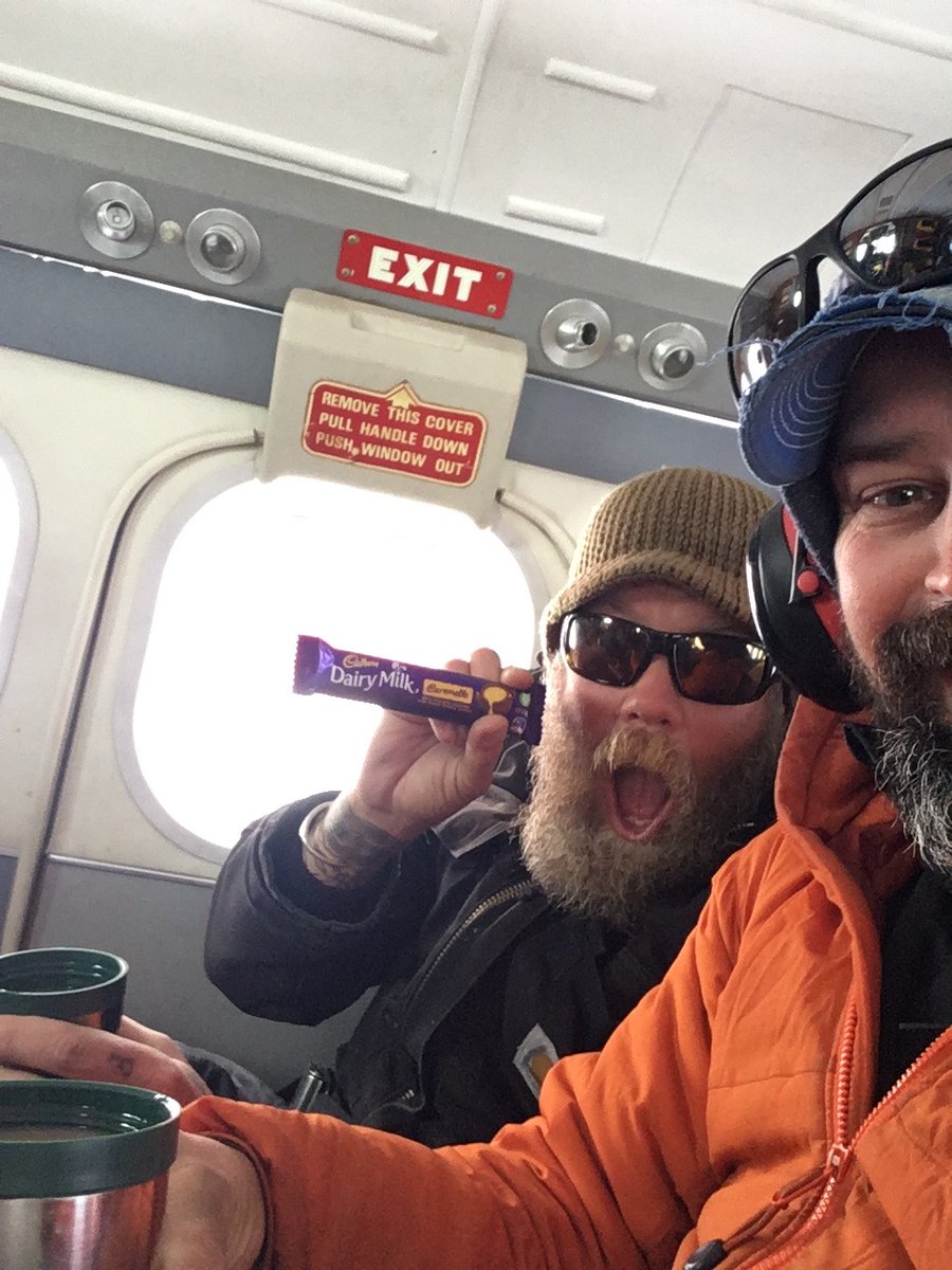 Chris displaying the last Caramello candy bar on the flight out from Mount Murphy on Thwaites Glacier! 