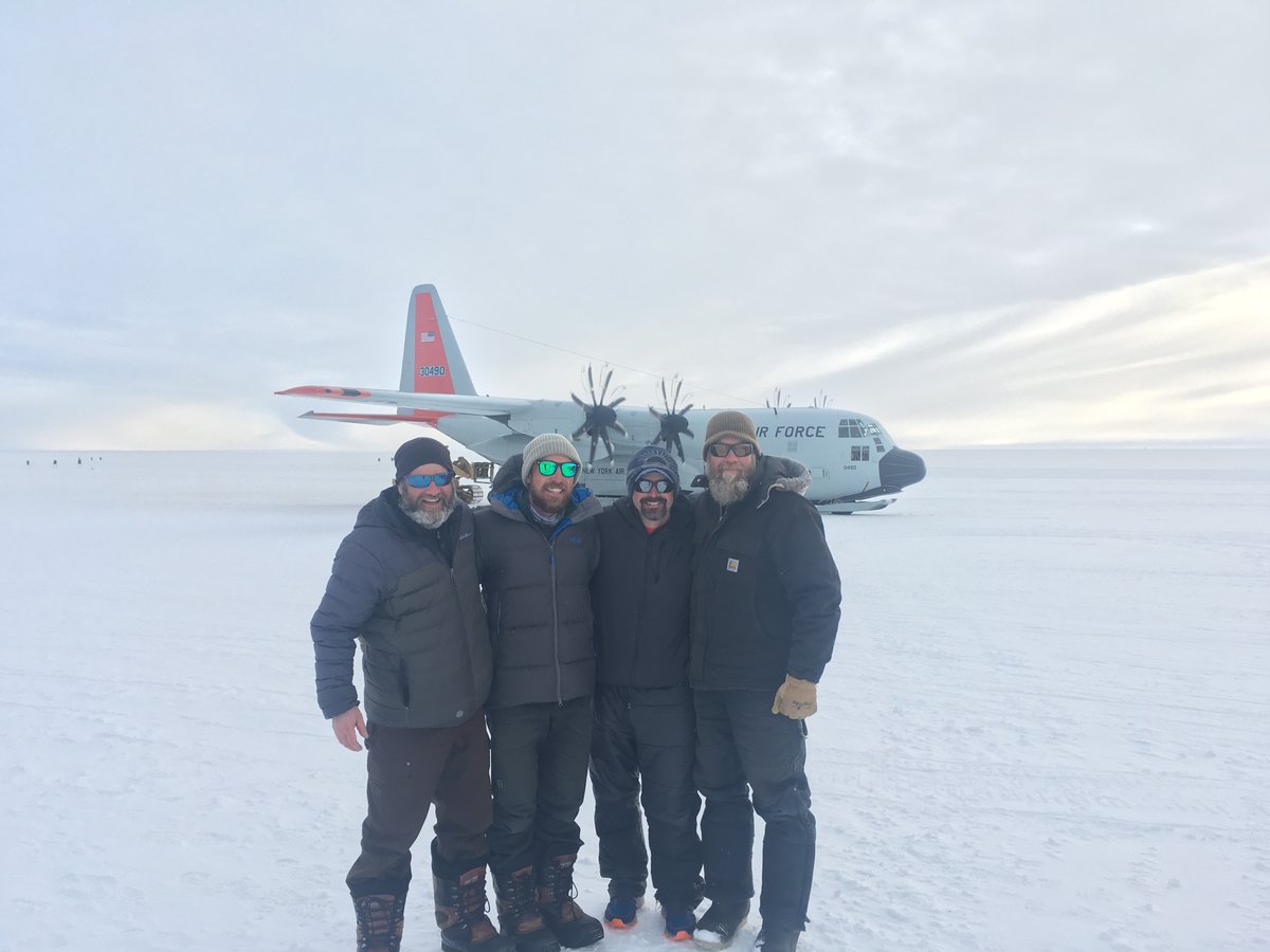 Grant & Jim from the Ice Drilling Program, professional IFMGA Guide Chris Simmons, and myself hanging by a Herc at WAIS Divide in West Antarctica!