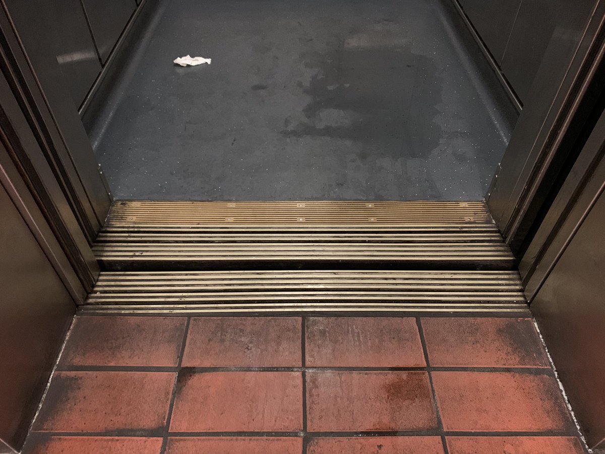 Urine pools on the floor of a BART elevator.