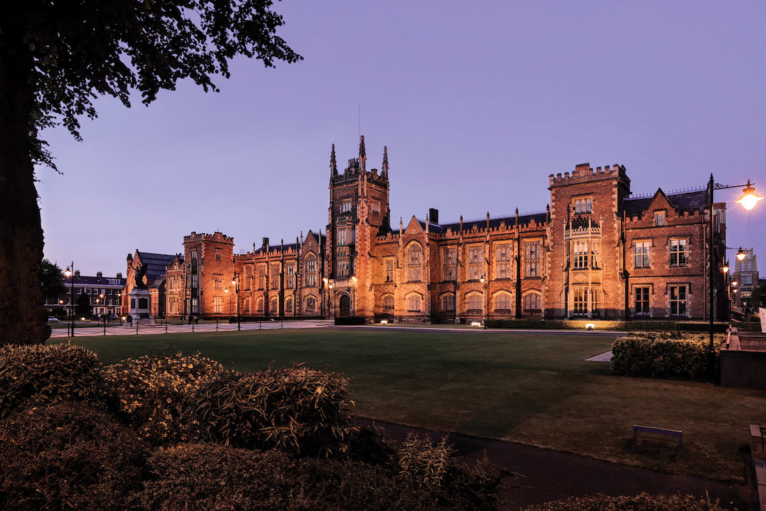 Image show the Lanyon building by night, with a purple sky.