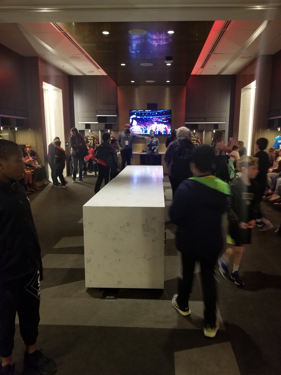 SharonFerrar's tweet photo. Inside the ATL United locker room enjoying our tour of Mercedes Benz Stadium. We miss you @roundsb4 https://t.co/pIz6i5L997