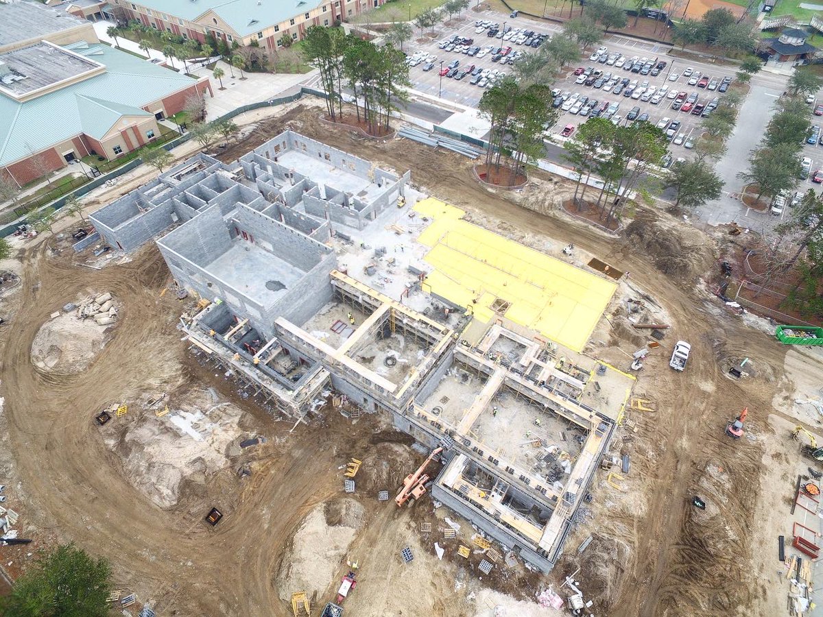 contract1984's tweet photo. Checking in on the West Ashley Center for Advanced Studies and the site is buzzing with activity!  Crews are hard at work laying block and running utilities. Next up: steel placement. Stay tuned!
#generalcontractor #underconstruction #contractconstruction #webuildschools https://t.co/KHfz4TZJ2i