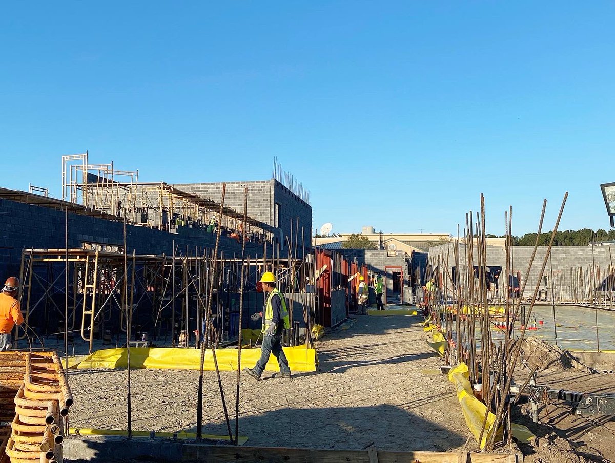 contract1984's tweet photo. Checking in on the West Ashley Center for Advanced Studies and the site is buzzing with activity!  Crews are hard at work laying block and running utilities. Next up: steel placement. Stay tuned!
#generalcontractor #underconstruction #contractconstruction #webuildschools https://t.co/KHfz4TZJ2i