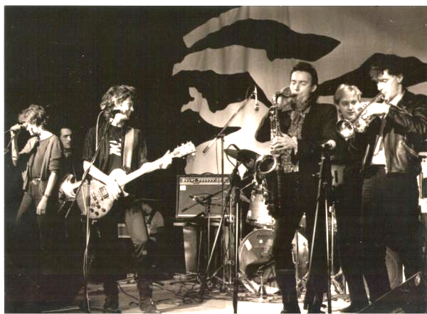 MickPuck's tweet photo. Only photo I have of #TheWaterboys first show, #BatschkappClub, Frankfurt, 19 Feb 1984. L-R #EddiReader, #JohnCaldwell, me, #AnthonyThistlethwaite, #MartynSwain, #RoddyLorimer. Not visible: #KevinWilkinson, #KarlWallinger. We closed with #SavageEarthHeart. https://t.co/ppanVBLStJ