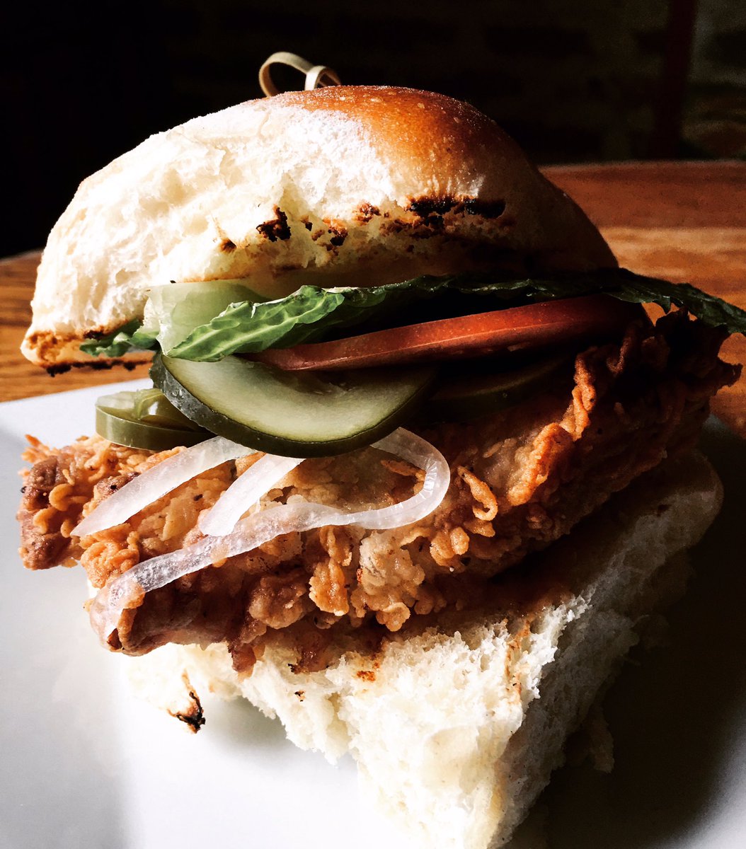 Say Hi to our new FRIED CHICKEN SANDWICH!! Pickle brined fried chicken, chipotle ranch sauce, pickles, lettuce and tomato! served with hand cut fries or salad! 
It’s da bomb! #friedchicken #queenvillage #phillyeats #HappyHour