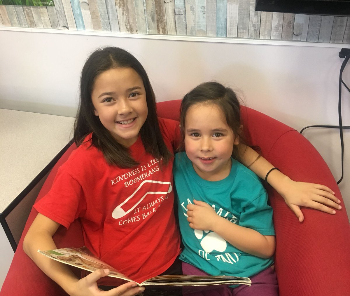 Ladera 4th grade students reading with their kindergarten buddies in the library. Thank you to our big buddies for inspiring a love for reading to our Little Leopards! #laderaleopards #wearetusd #
