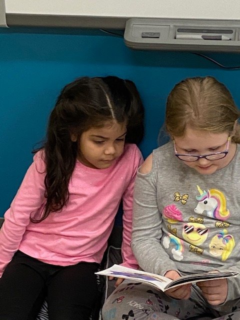 readsomething1's tweet photo. My third graders sharing books with Kindergarten. https://t.co/zbODdummxo