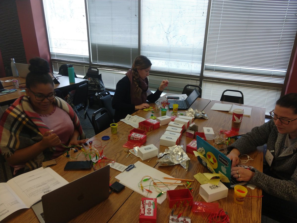 A small group of teachers and administrators learn to use Makey Makey for the first time!
