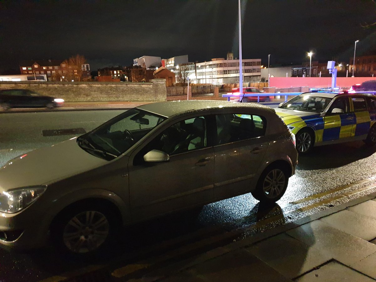 gmptraffic's tweet photo. Driver of the Astra was totally unaware of the liveried traffic car directly next to him as he drove along St Peter's Way Bolton on his mobile phone. Stopped by #XT14 and TOR issued #fatal5 #wrongfortheroad https://t.co/RqSiSC8AI0