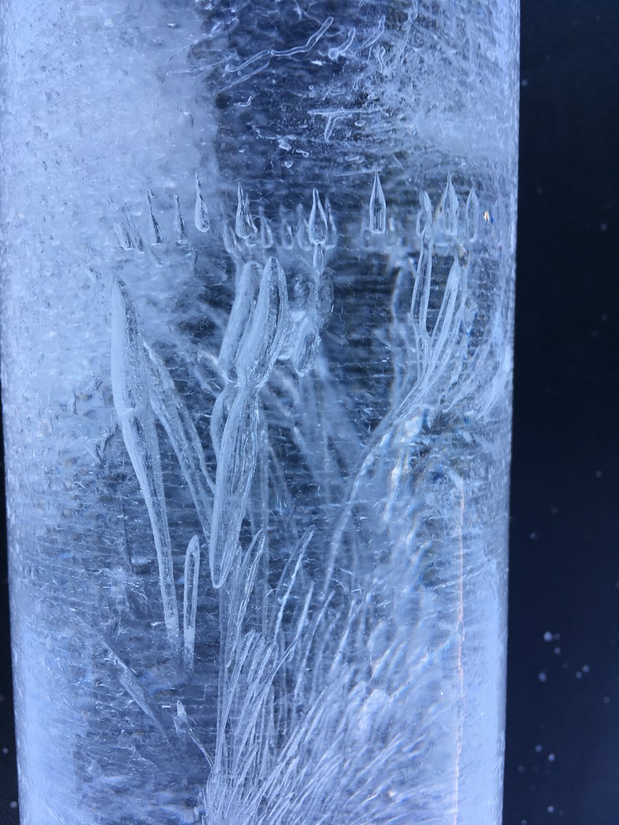 These melt and refreezing features remind me of glass blowing!  