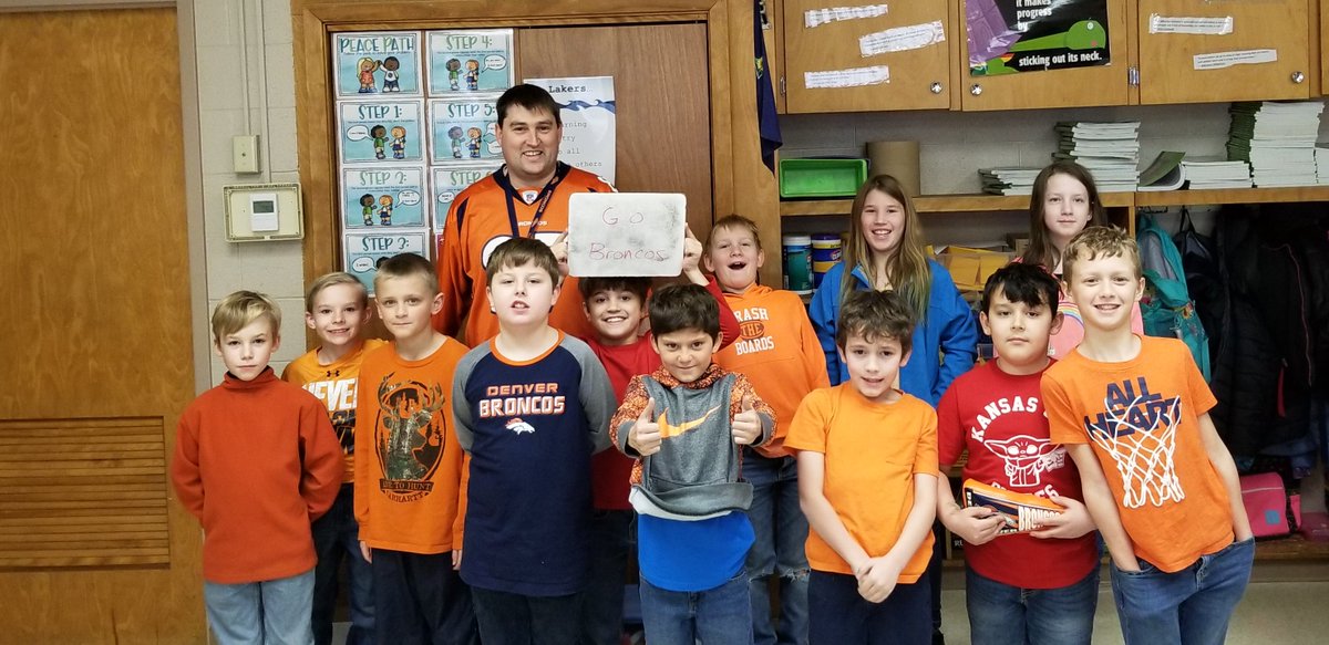 crmill29's tweet photo. Deep in the heart of #ChiefsKingdom, These members of #BroncosCountry   wear their orange and blue proudly.  #orangeFriday #BroncosinKansas https://t.co/WQpGA8fxYB