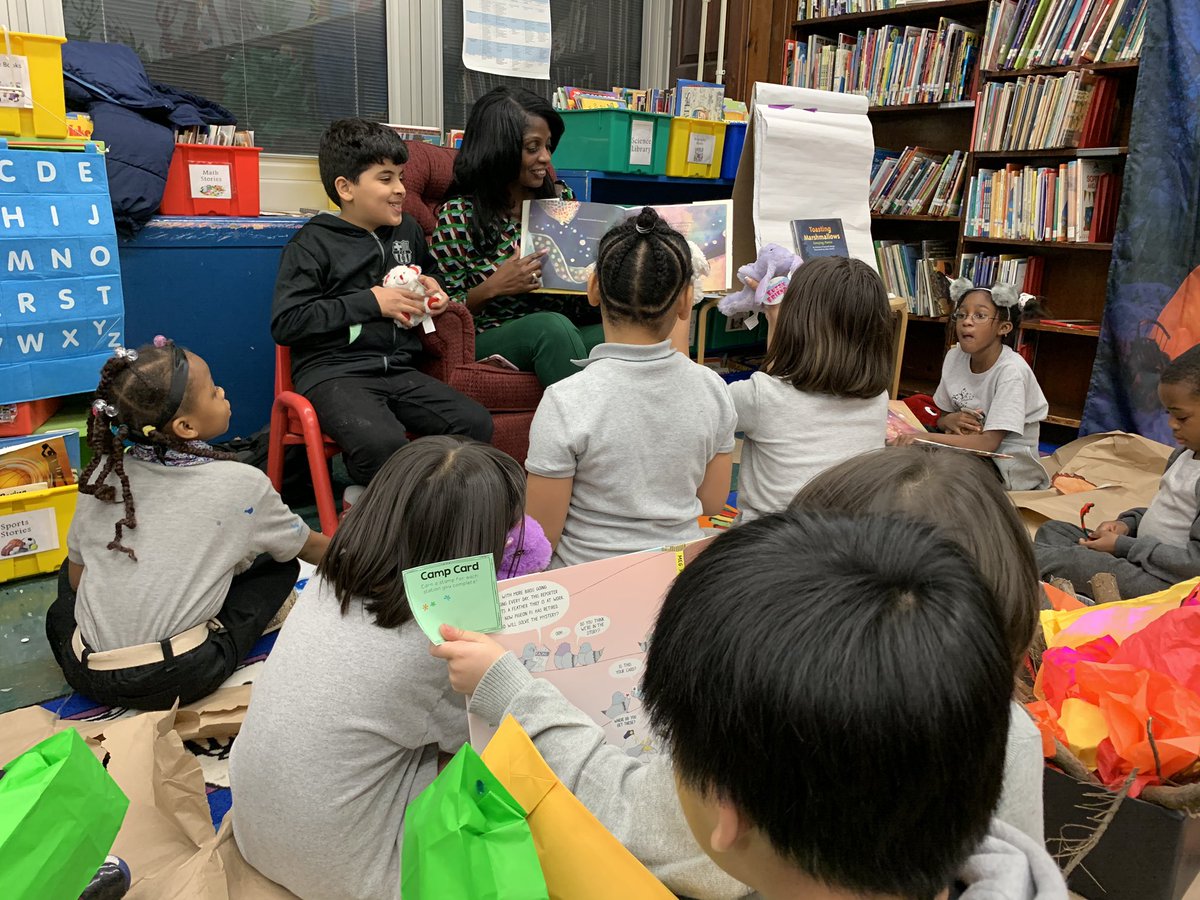 MsJairam's tweet photo. Principal @DionneJaggon reading to her students under the stars at the Camping with Books and Bears event! ⭐️📖

 #cs111q #JewelofLongIslandCity https://t.co/baaPauaDdT