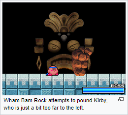 Wham Bam Rock attempts to pound Kirby, who is just a bit too far to the left.