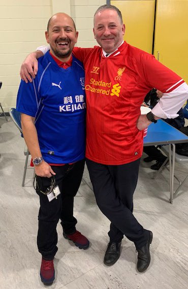 CaldiesSchool's tweet photo. Our staff are brilliant! One Everton fan raises lots of money for @REDJanuaryUK by receiving sponsorships for wearing an @LFC shirt for the day. The other, a Liverpool fan wears an Everton shirt and doubles the money raised. #justbrilliant #MentalHealthAwareness https://t.co/2QL8eTW24p