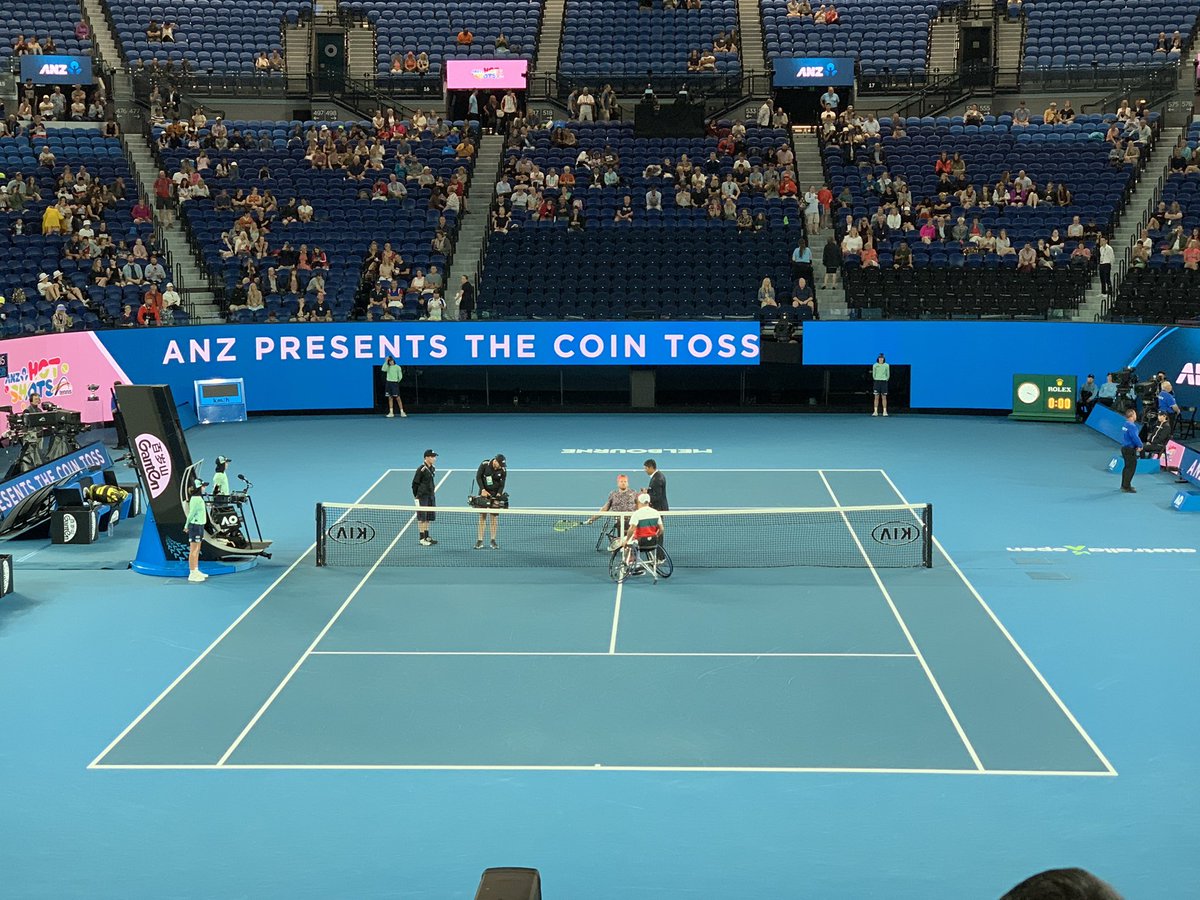 Photo of Tennis players Dylan Alcott and Andy Lapthorne at the coin toss for the Quad Wheelchair Singles Final at Rod Laver Arena