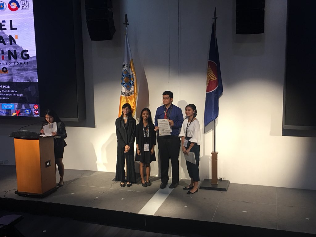 USTModelASEAN's tweet photo. Ms. Rane Yrabelle Deseo is now awarding the delegates of the Political-Security pillar their certificate of participation. 

#USTMAM2020 https://t.co/6mRAh6Unx3