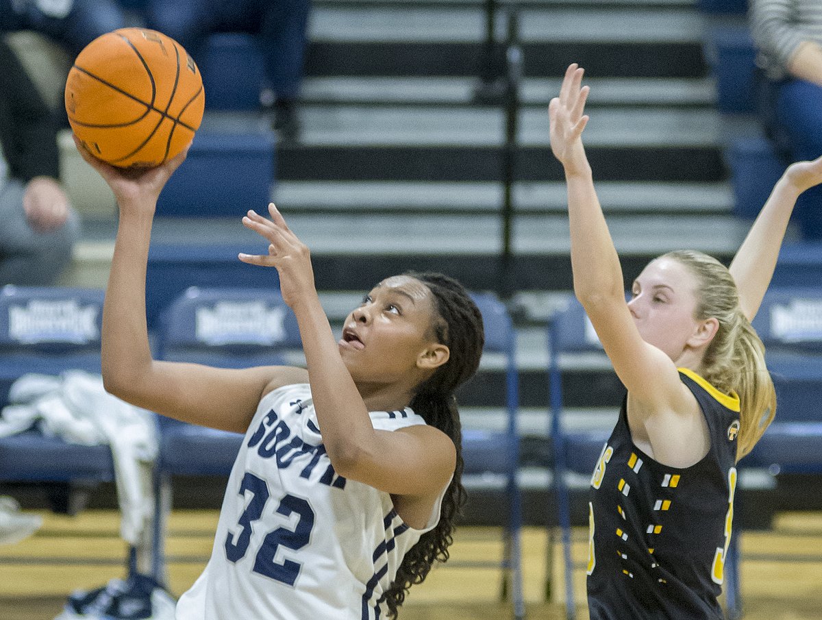 MichaelGPaul's tweet photo. Nija Bryant @athletics_sbhs @sbhs_wbb shoots as a Topsail player tries to defend. Bryant scored 21 points. https://t.co/Woy5q7K1K9