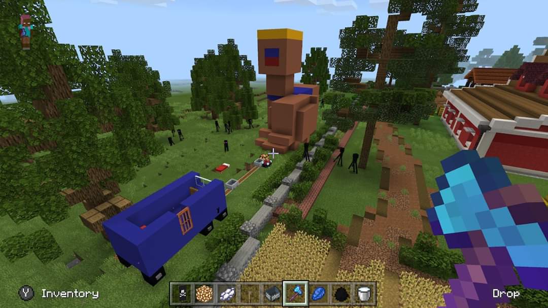 5yo: I've built my teachers baby!Me: Oh, this I HAVE to see! Guys -it's as amazing as it is terrifying! He's set up a little minecart toy for him to play with. The nearby animals keep climbing in and taking rides! #Minecraft