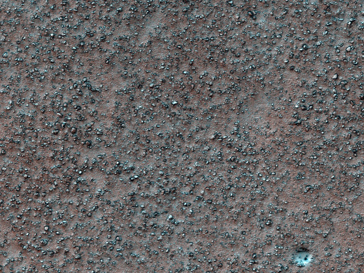 In the Land of Boulders: There’s something hypnotic of this full resolution look at a boulder field within Huxley Crater. Huxley is 107 kilometers in diameter, and was named after British biologist Thomas Henry Huxley. (NASA/UArizona)