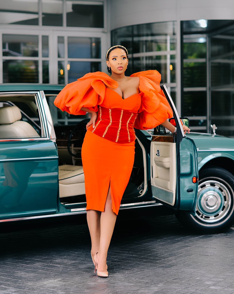 African Luxury.
Photography @ramiieg on ig 
Dress by @Orapeleng on ig 
Makeup @sikelela_siki 
Driven by Dimbane classic cars on ig 💋
#SunMet2020 
#AfricanLuxury