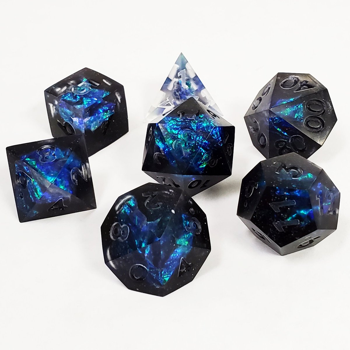 A set with no name (yet) one of the most recent pulls!
#diceporn #handmadedice #dicemaker #dice #diceporn #resincraft #dnd #dndbeyond #criticalrole #critters #dndcommunity #ttrpg #diceyencounters