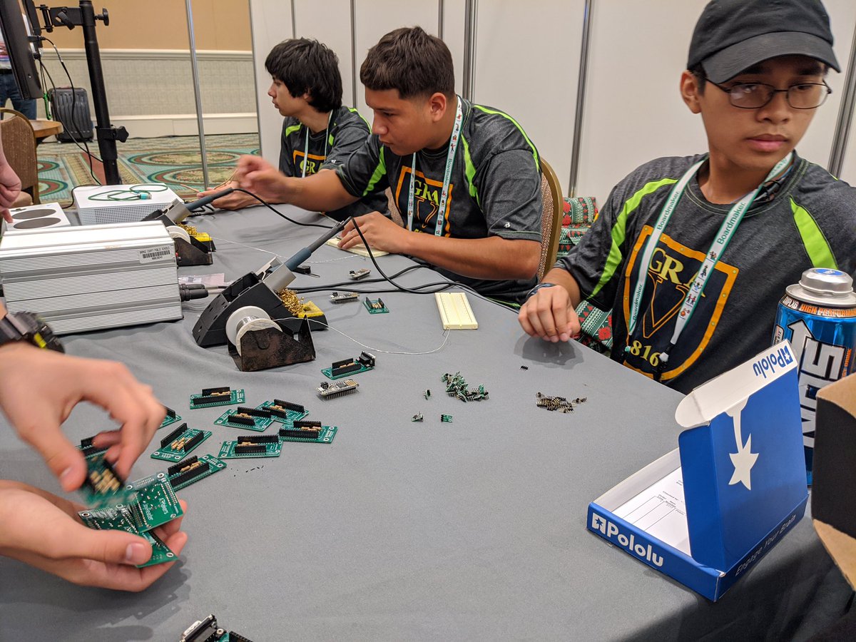 Shot of people building the adapters