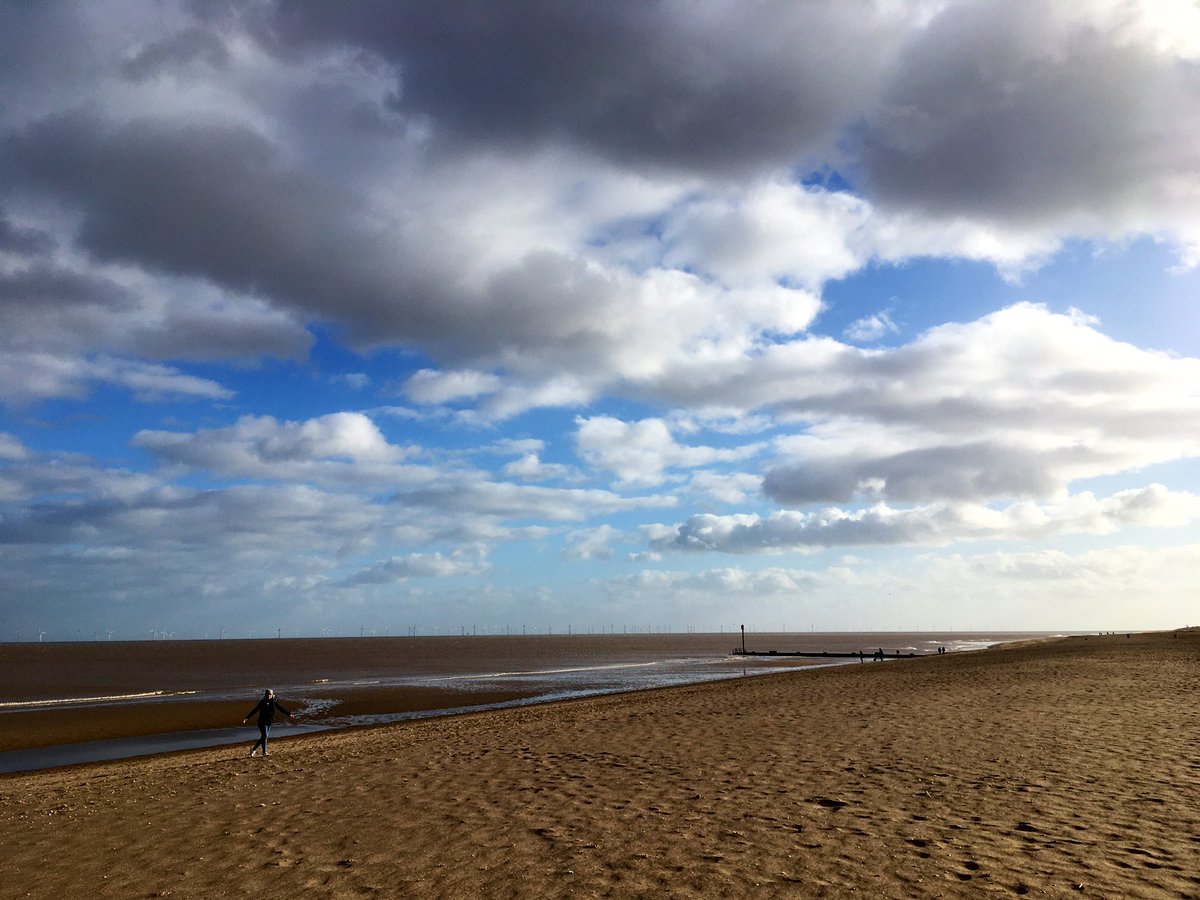 SimonJThompson's tweet photo. My amazing wife having a little beach dance today. Blowing away the cobwebs on the deserted east coast. #bigsky #naturebathing #sea #sand #breezy https://t.co/1oynx8cokT