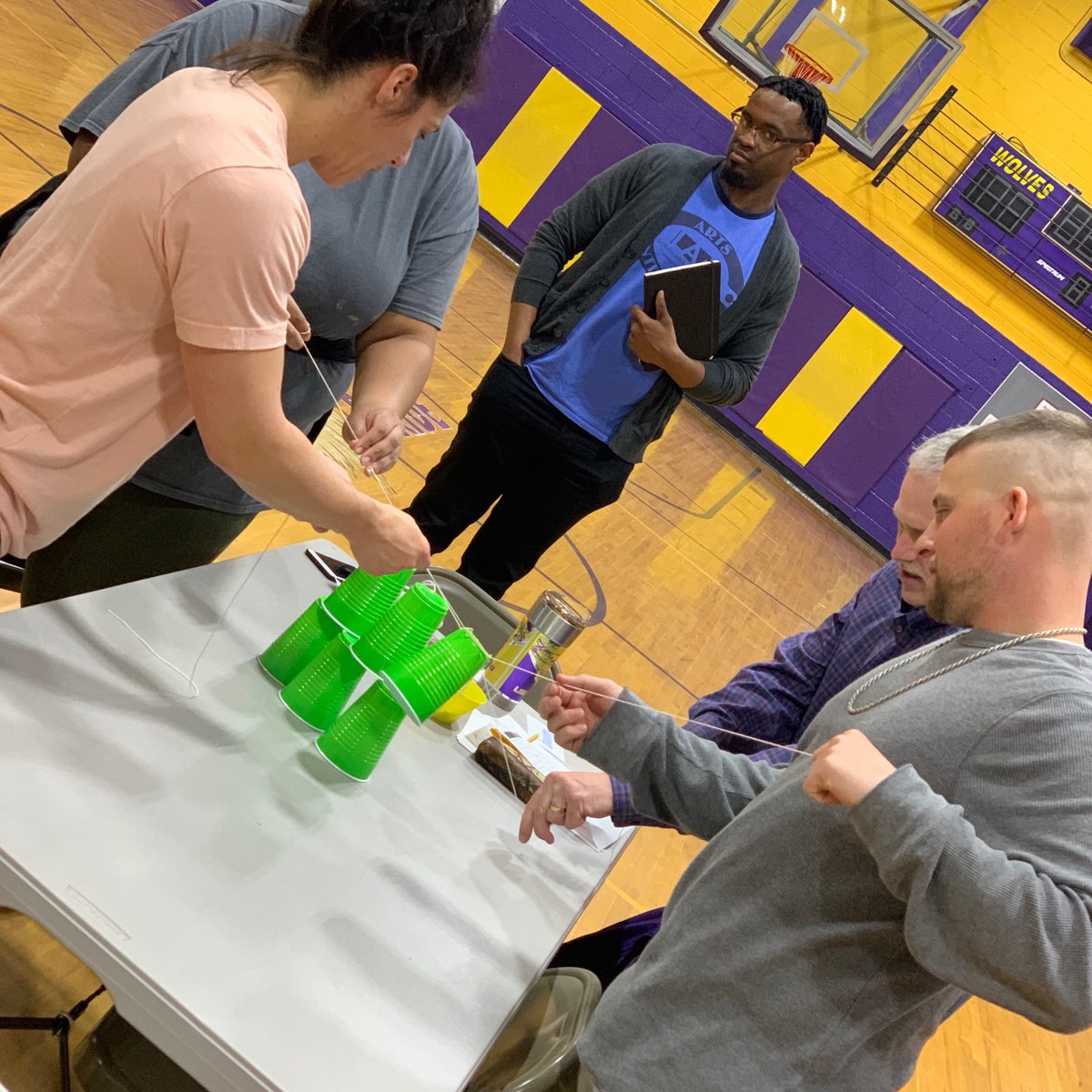 APlusLaLSU's tweet photo. Stack em up! Teachers are challenged to create a tower of cups without using hands or voices. #STEAM #EXLA #aplusla https://t.co/DqGQpt20B8