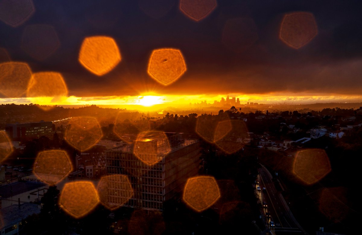Vibrant sunset view of the Downtown LA skyline in the distance from Cal State LA