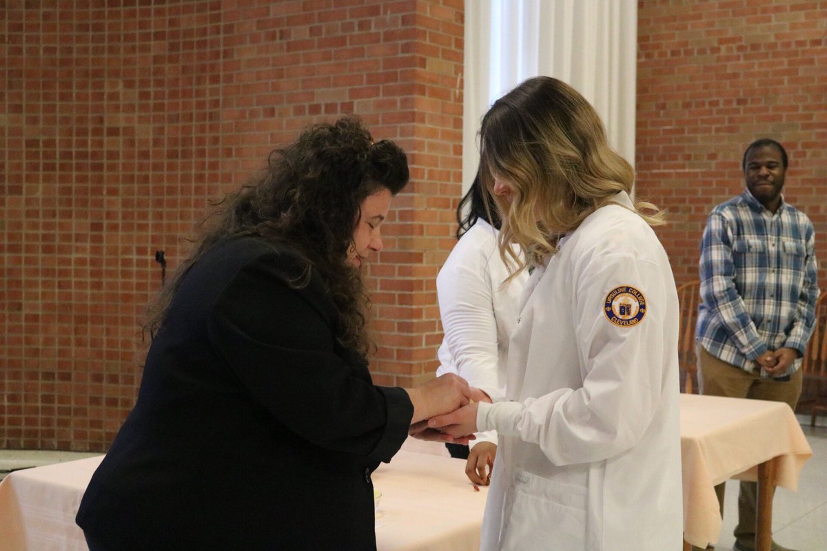 UCArrowsSoccer's tweet photo. Congratulations to sophomore @odessastrizzi and all the other nursing students who recived their white coats and blessing of hands yesterday! Good luck with the start of clinicals! #ArrowsInAction #UrsulineCollege #BreenSchoolOfNursing #TraditionStartsHere https://t.co/y7lOH7PSw3