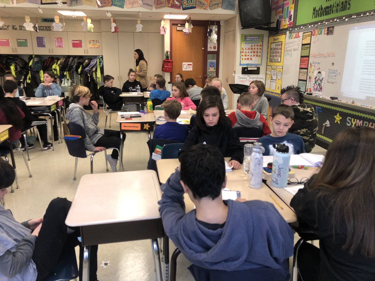 Fridays are Poetry Cafe days. Here are some students from 6M and 6Q writing poetry.