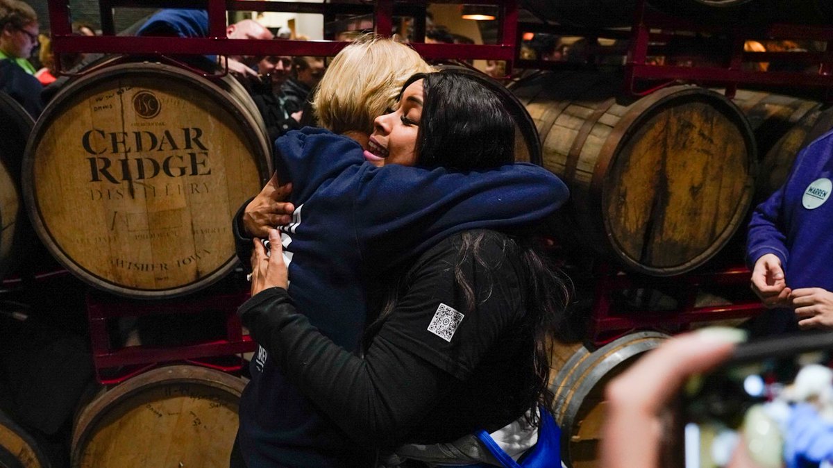 Elizabeth Warren hugs a supporter.