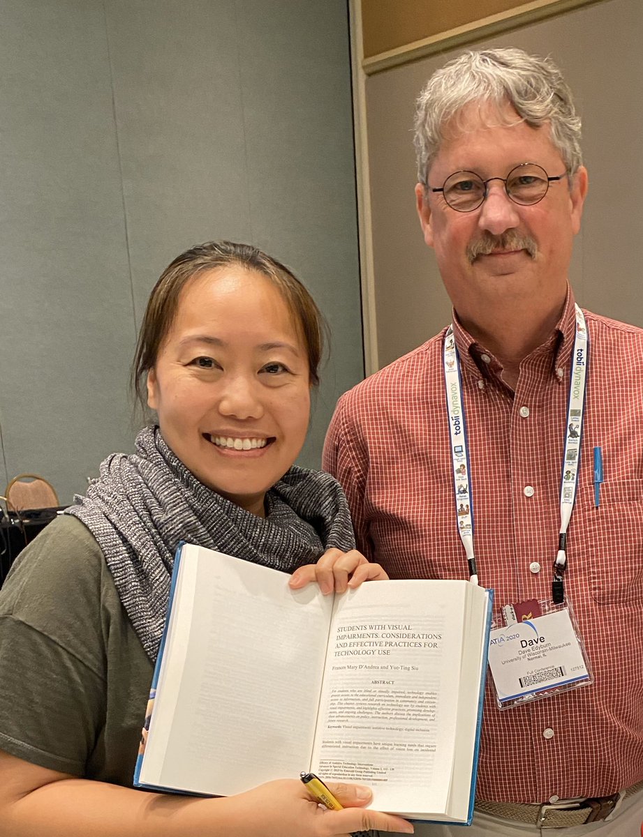 Ting holds the book open to the title page of her chapter. She stands next to Dave!