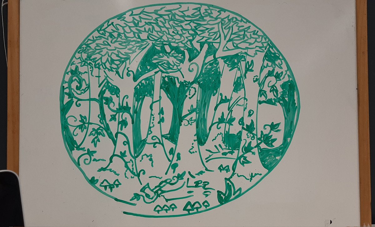 Photo of the original drawing on a whiteboard, of an dark and deep ivy-laiden forest.