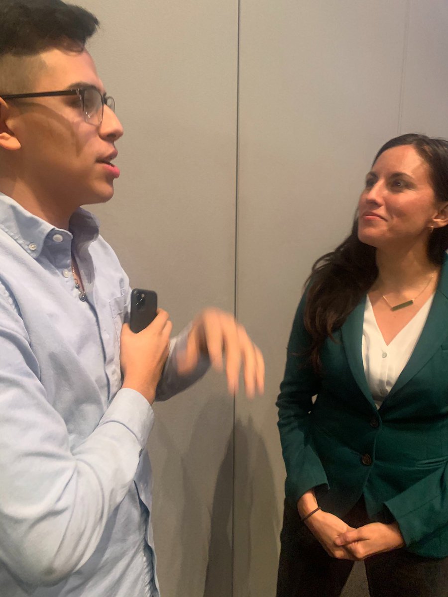 Cristina listening to a voter she’s engaging in conversation with.