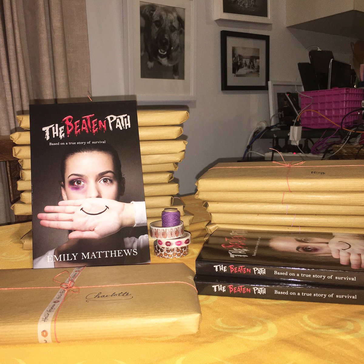 Emiloly's tweet photo. Whose idea was it to sign all these books? 😂😂🙈
❤️😍
Bonus Bessie cameo in the back there, the goodest of girls.
#thebeatenpath #thebeatenpathbook #book #novel #autobiography #mystory #survivor #domesticviolence #domesticviolenceawareness #whiteribbon #silencehidesviolence https://t.co/l7kksCzrR8