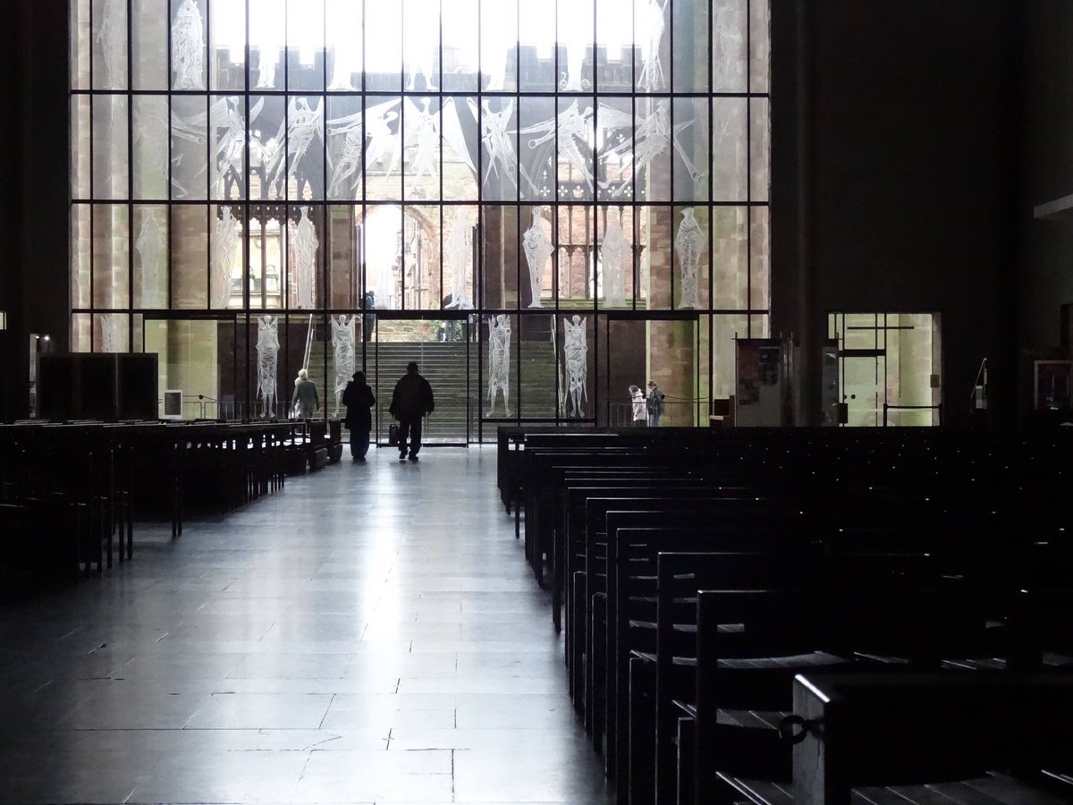 AMFelice's tweet image. So sad to read of the engraved window, by John Hutton part of entrance, smashed during a break-in at Coventry Cathedra. So so sad &amp;amp; shameful. Repair or replace? Wait in hope! Pic taken on my visit in 2016. @CovCathedral #coventrycathedrial #johnhutton #covcath #heritagetreasures