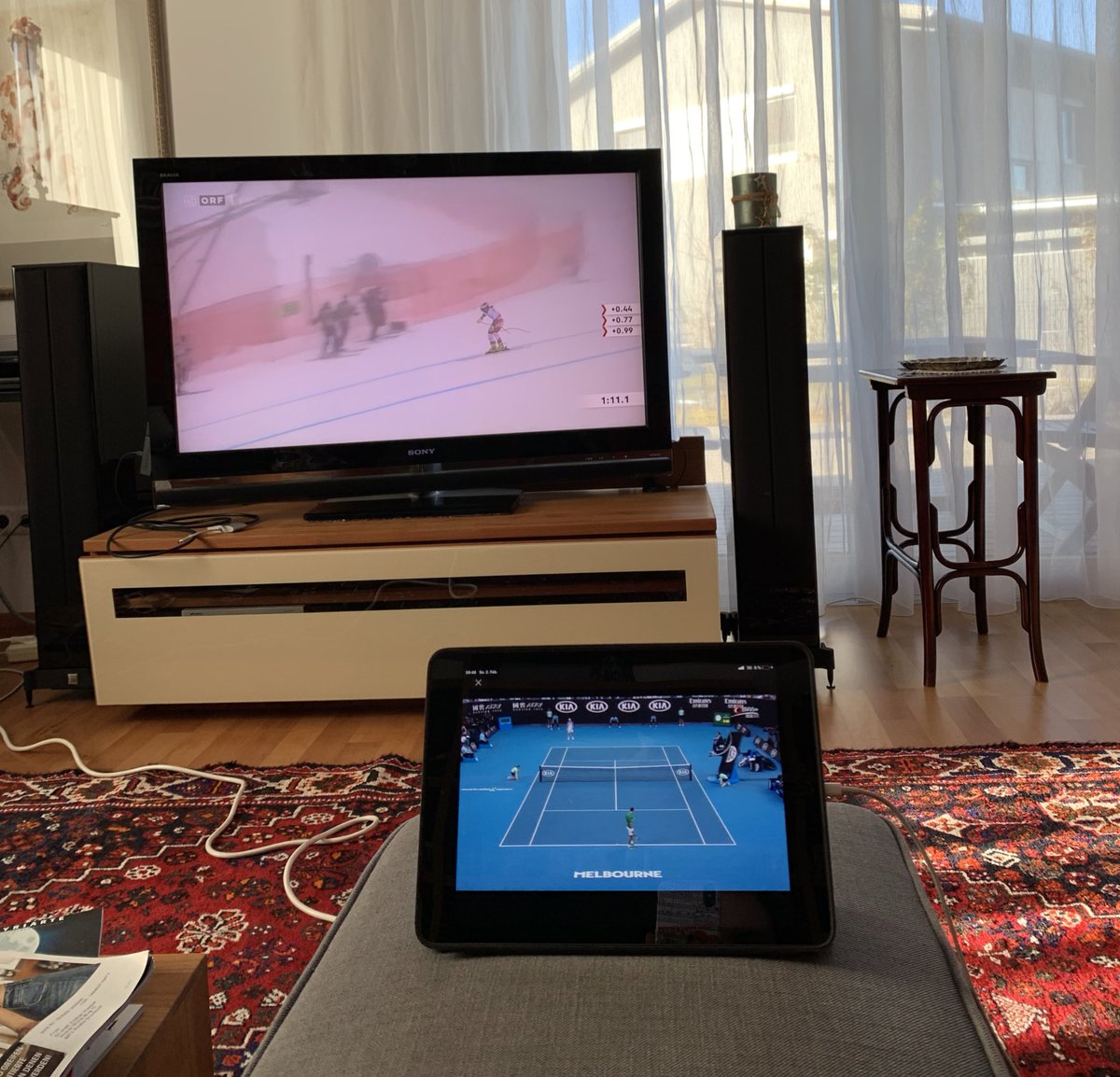 operafangirl's tweet photo. Simultaneously watching a tennis match and a ski race 😎 #austrianproblems https://t.co/MdlTvjYCop