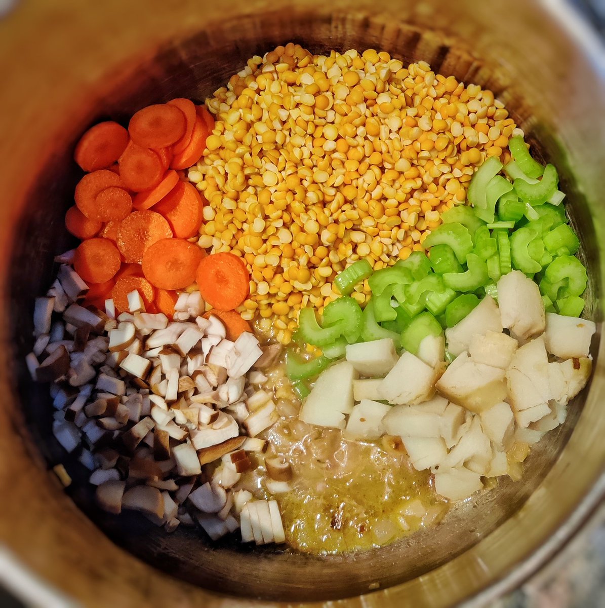 sed's tweet image. Yellow Split-pea soup. Seen in the pressure cooker. #pressurecooker #pressurecooking #splitpeas #splitpeasoup #yellowsplitpeas  #garlic #onions #basil #oregano #broth #rosemary #potato #shiitake #celery #carrot #soup #beavercreekoregon