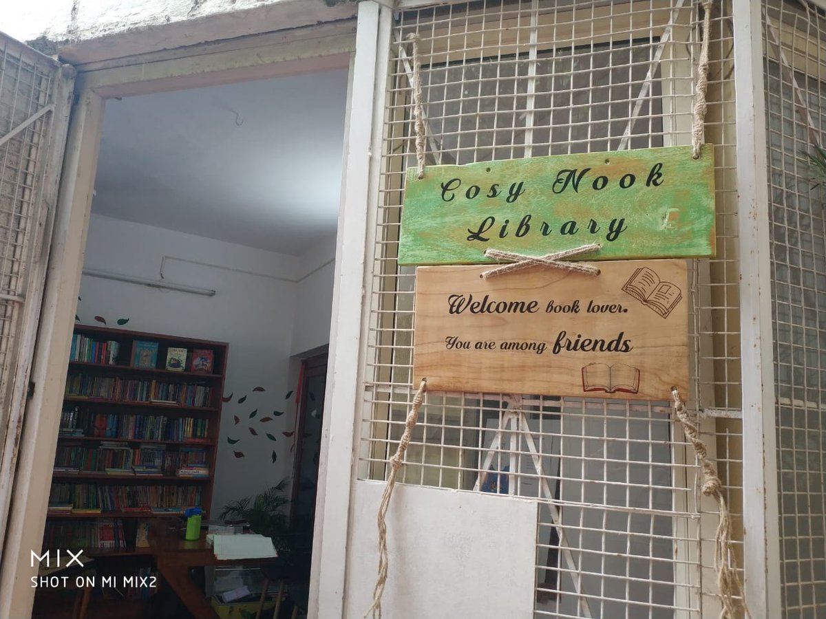 NookCosy's tweet photo. A library attracts generosity and friends. Our signboard is up, made out of upcycled materials and sent all the way from Goa by a generous aunt. It's just perfect. Come visit us. Make a friend. #friendsoflibrary #library #kidslibrary https://t.co/nQZND48X3N