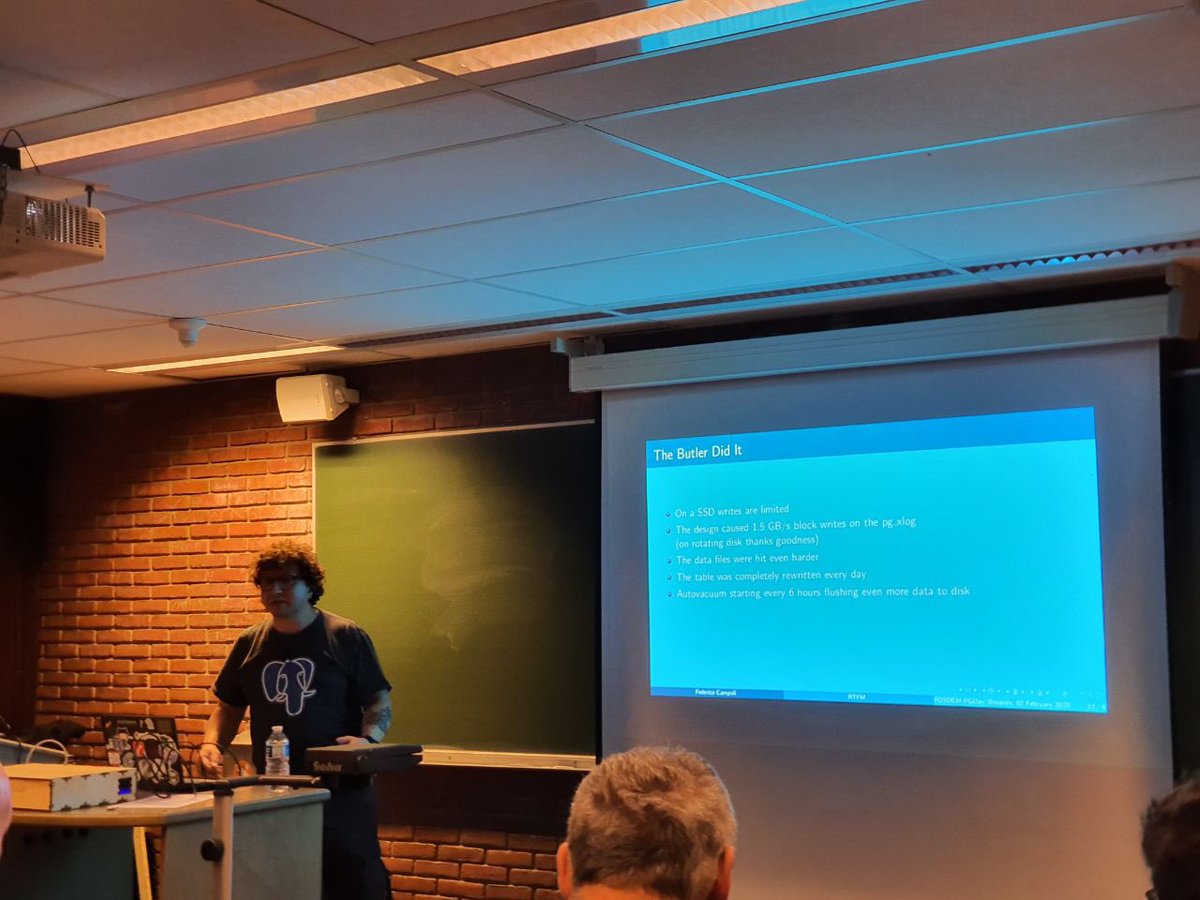 Federico Campoli presenting on RTFM in the Postgres devroom at FOSDEM