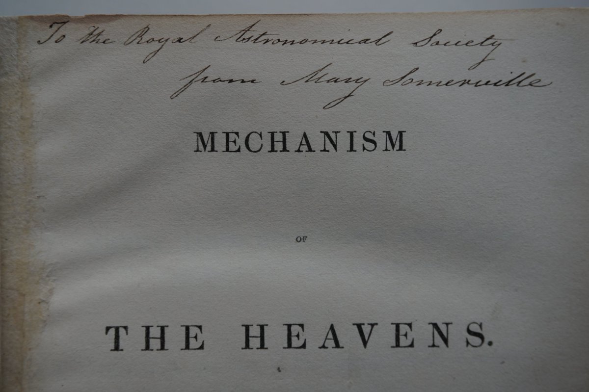 The title page of Mechanism of the Heavens, inscribed 'To the Royal Astronomical Society from Mary Somerville'