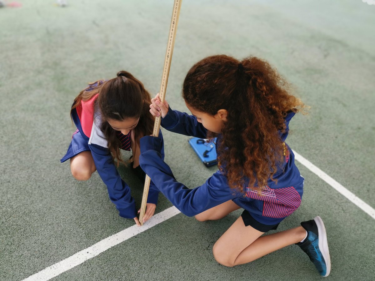 Students are working together to problem solve and measure a space that is larger than our measuring tools. They will be using the dimensions of this outdoor space to create backyard designs in Assemblr.