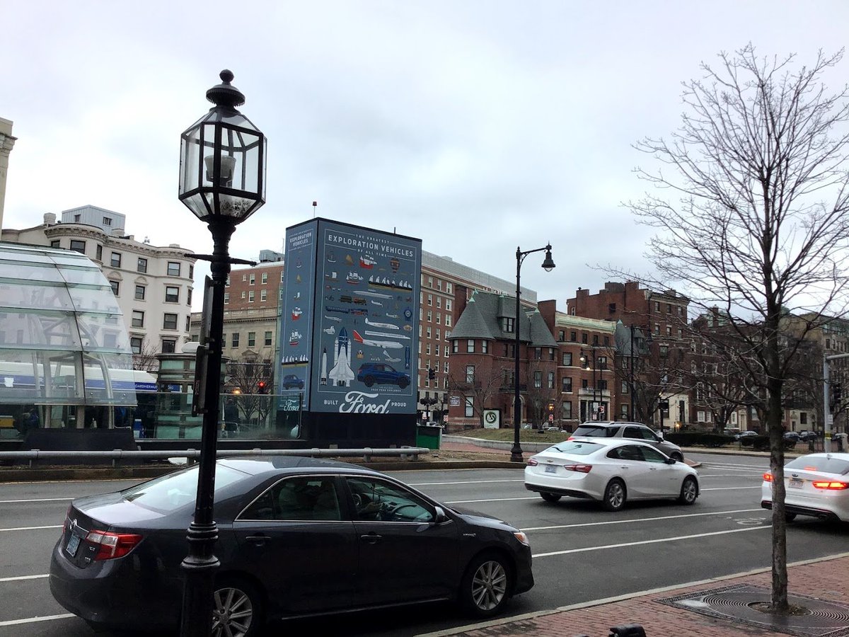 a view of buildings across a street